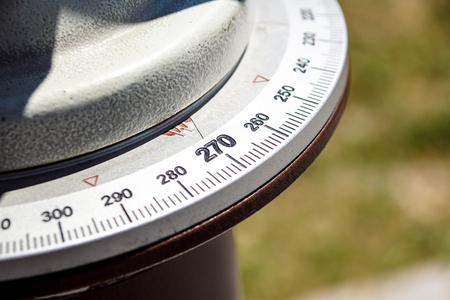 close up at numbers on compass and set of rulersの写真素材