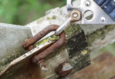 old climbing carabiner .metal hook rustyの写真素材