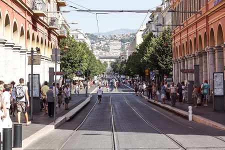 NICE, FRANCE - july 14, 2017: Tourists and local people walking on the charming vintage streets of Old town in Nice, France.のeditorial素材