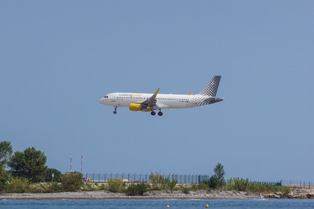 Nice France - August 14 2017 : AirBus A320 of vueling.com airline landing at Nice Airportのeditorial素材