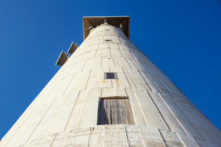 sunny morning the lighthouse of Morro Jable in Fuerteventura island with blue sky in backgroundの写真素材