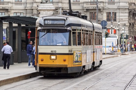 MILAN, ITALY - APRIL 11, 2015: Vintage orange tram ATM Class 1500 on the street of Milan, Italyのeditorial素材