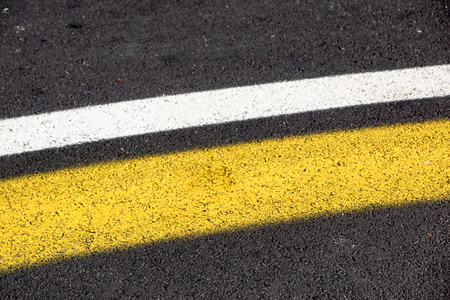 Asphalt Road Texture With Yellow and white Dash Stripの写真素材