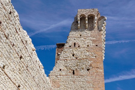 ruins of old medieval castle . fortified wall and tower detail brickの写真素材