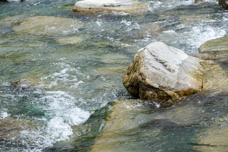old house wall with wooden door and windowの写真素材