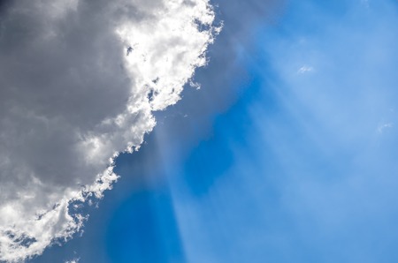 Blue sky with clouds background . sun rays
