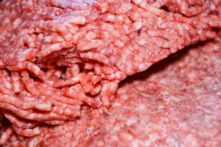 minced pork meat close up, can be used as a background .の写真素材