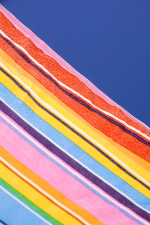 Detail of colorful sunshades in the beach on a sunny summer dayの写真素材