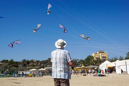 CERVIA, ITALY, APRIL 2018: Many colorful kites in different shapes at Cervia international kite festival Artevento 2018, located on pinarella beach.のeditorial素材