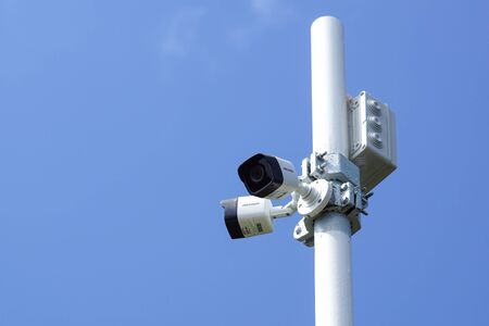 Milan, Italy - August 10, 2018: Hikvision video surveillance cameras on pole . The brand is widespread throughout the world .のeditorial素材