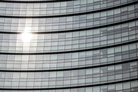 Conceptual image of textured window facade of modern design skyscraper office buildings in city...