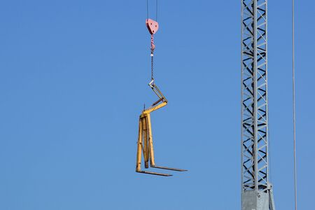 Close up details of a crane's . metal crane used in construction .