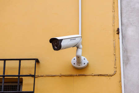 Milan , Italy - MAY 11, 2019: Hikvision video surveillance camera on wall placed around the houseのeditorial素材