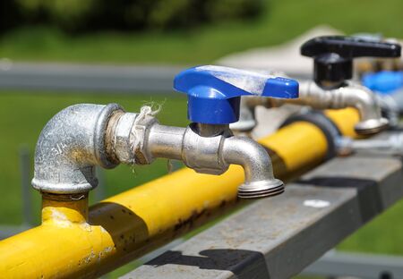 Tap with drinking water, the valve is closed .Water consumption concept. World Water Day