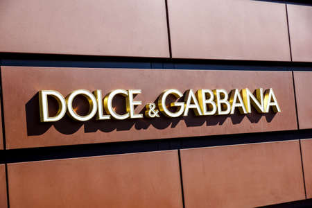 Florence,ITALY -December 8, 2011: Dolce Gabbana Florence Store Logo Italy mounted on the marble wall of Dolce Gabbana Store at Via de Tornabuoni,the heart of Florence high-class shopping districtのeditorial素材