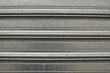 Metal plate texture with redish rust stainsの写真素材