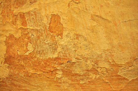 Wall of an ruined, old house as a background image.