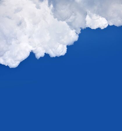 A beautiful white cloud on a blue winter skyの写真素材