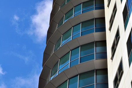 corporate office building with large, glass windowsの写真素材