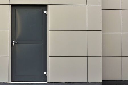 Gray metal door, modern arhictecture exterior detail.の写真素材