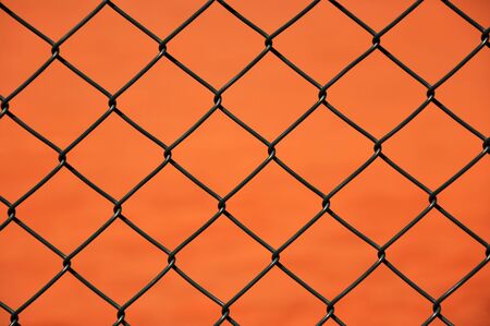 Close up photography of a grid metal net fense.の写真素材