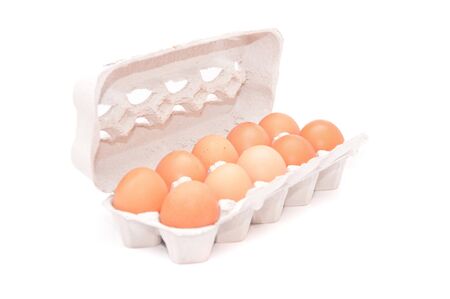 Chicken eggs in a cardboard boxの写真素材