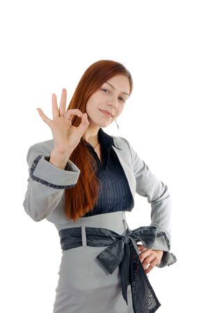 Young and beautiful business woman in light gray suit portraitの写真素材