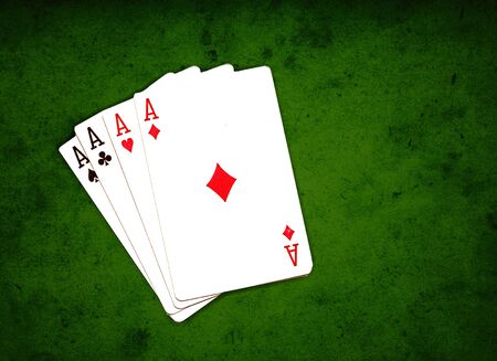 poker, four aces over the grungy green background