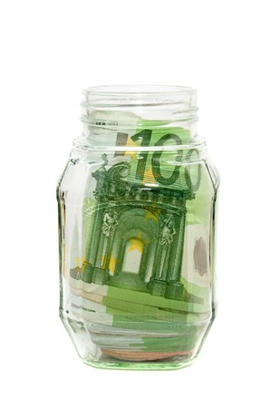 Savings in a jar isolated on white の写真素材