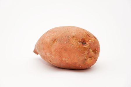 organic potato over a white backgroundの写真素材
