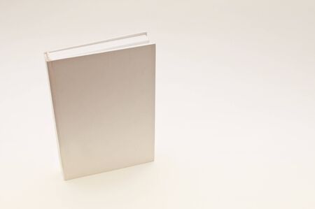 Blank white cover book over a white backgroundの写真素材