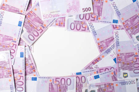 A pile of euro banknotes scattered aroundの写真素材