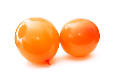 Orange ballons, image is taken over a white backgroundの写真素材