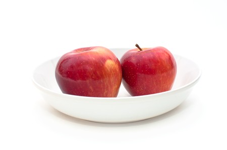 A pair of red fresh organic apples, close up image.の写真素材