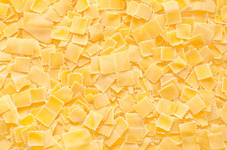 Pile of yellow noodles, close up imageの写真素材