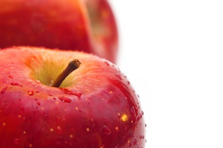 Organic apple, photo is taken over a white backgroundの写真素材