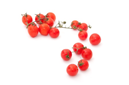 Fresh tomatoes on a white backgroundの写真素材