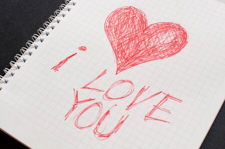 Love note handwritten on a white paperの写真素材