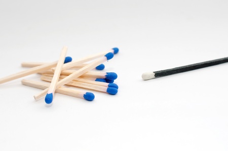 Macro of matches over a gray background. の写真素材