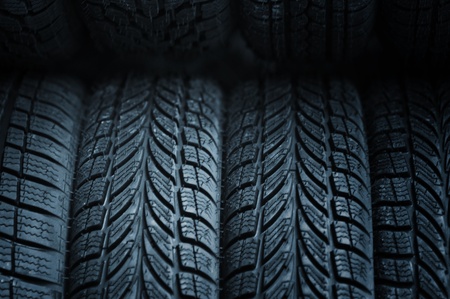 A stack of car tires, close up image