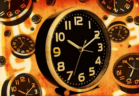 Vintage clock over a grunge paper background