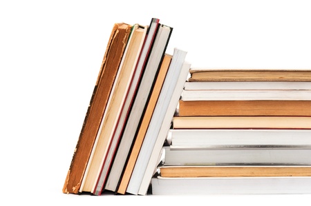Pile of books, close up image over a white backgroundの写真素材