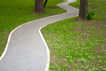 A winding path through the parkの写真素材