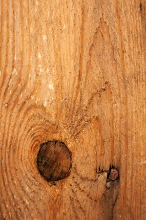 Brown wood texture with natural patterns, image can be used as a background for a design.の写真素材