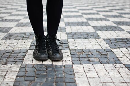 Teen in sneakers on the streetの写真素材