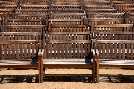 Old grungy wooden benches in the parkの写真素材