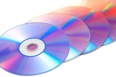 A pile of dvd discs over a white background