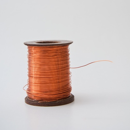 Copper wire rolled up on a spool