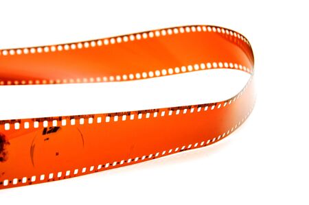 Overexposed old camera film strip over a white backgroundの写真素材