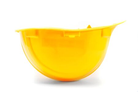 Yellow hard hat, protective equipment in construction industry の写真素材